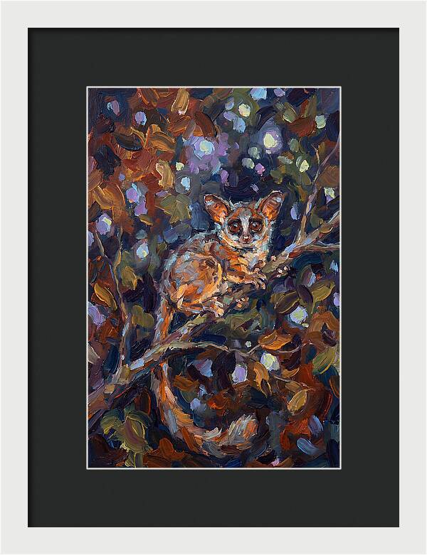Bushbaby Among Vibrant Foliage