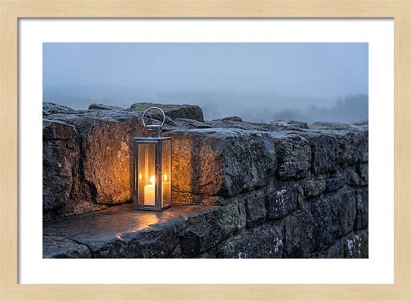 Candle Lantern Illuminating Stone Wall