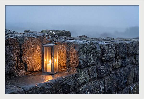 Candle Lantern Illuminating Stone Wall