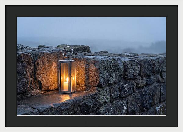 Candle Lantern Illuminating Stone Wall
