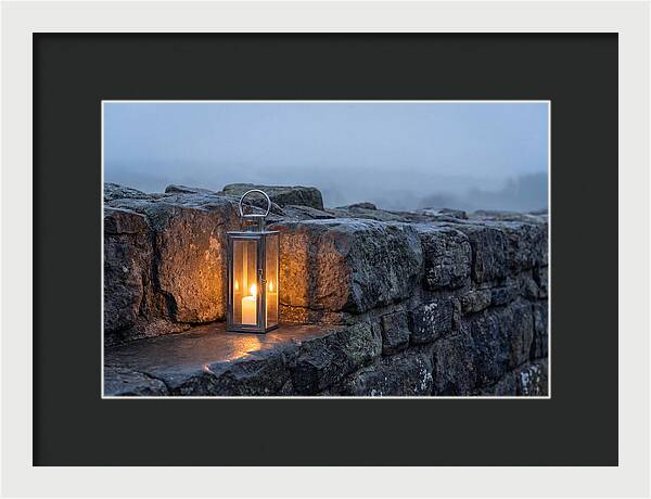 Candle Lantern Illuminating Stone Wall