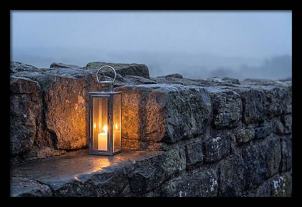 Candle Lantern Illuminating Stone Wall