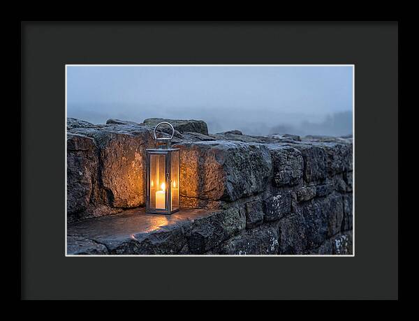 Candle Lantern Illuminating Stone Wall