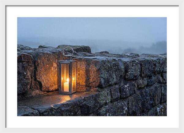 Candle Lantern Illuminating Stone Wall