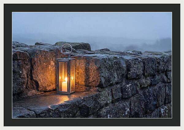 Candle Lantern Illuminating Stone Wall