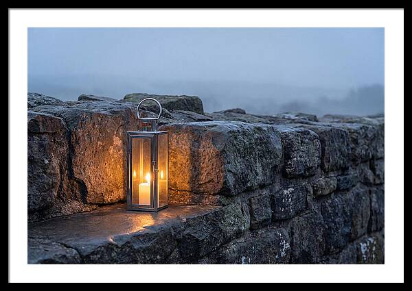 Candle Lantern Illuminating Stone Wall