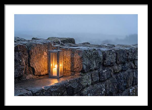 Candle Lantern Illuminating Stone Wall