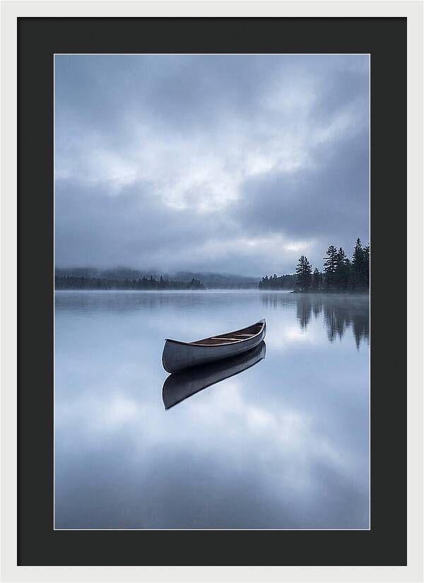 Canoe On A Tranquil Lake