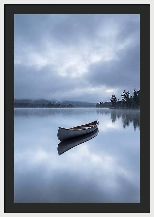 Canoe On A Tranquil Lake