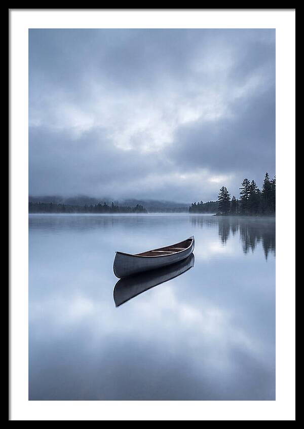 Canoe On A Tranquil Lake