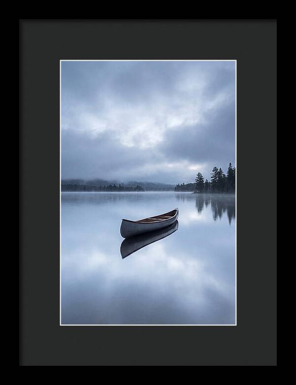 Canoe On A Tranquil Lake