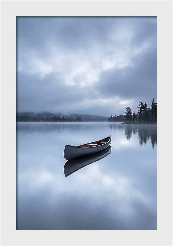 Canoe On A Tranquil Lake