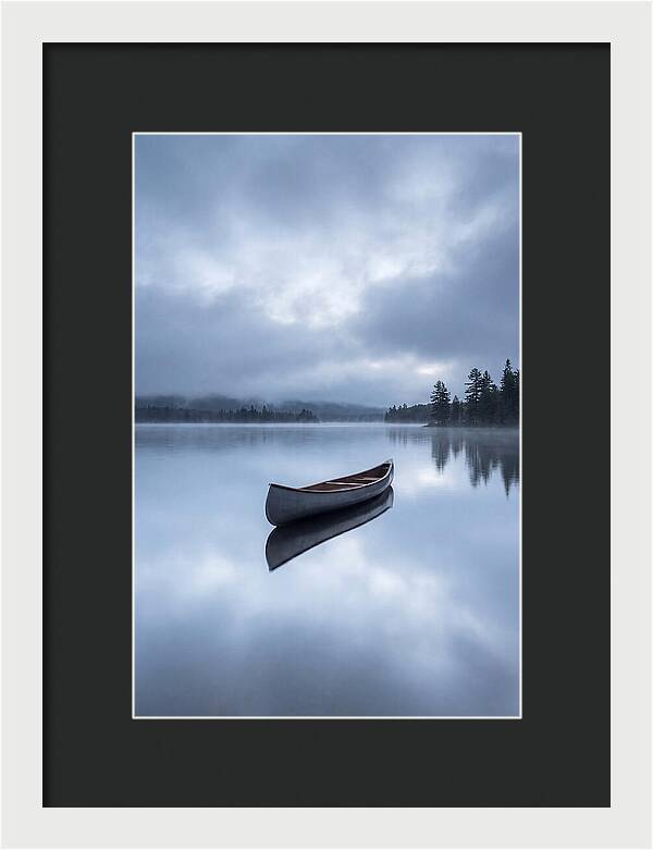 Canoe On A Tranquil Lake