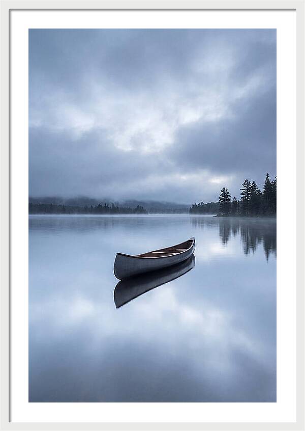 Canoe On A Tranquil Lake