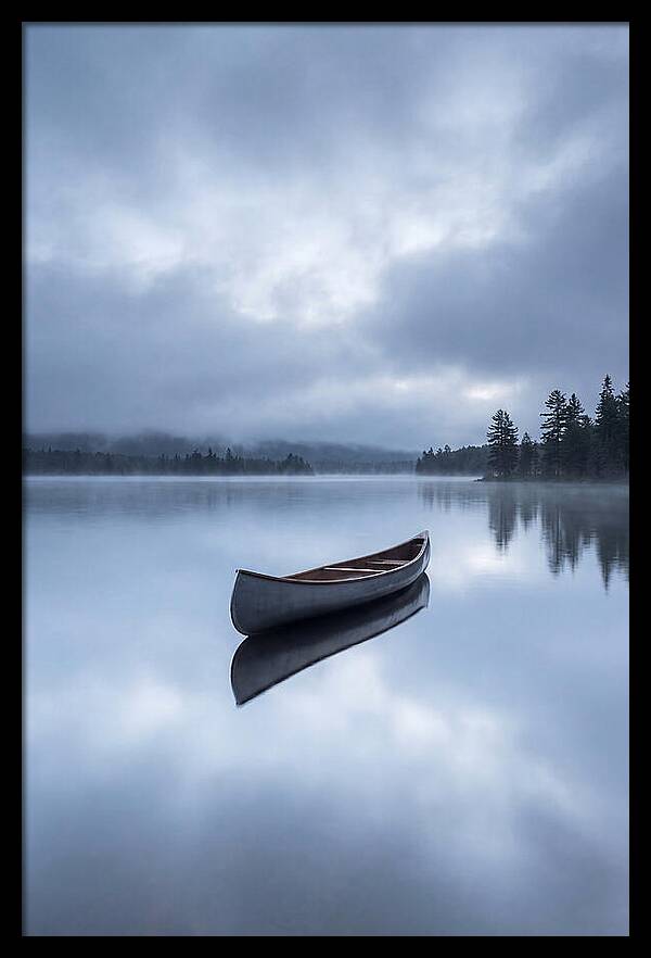 Canoe On A Tranquil Lake