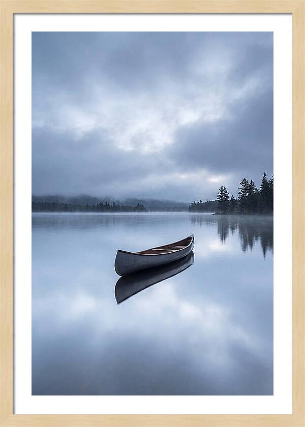 Canoe On A Tranquil Lake