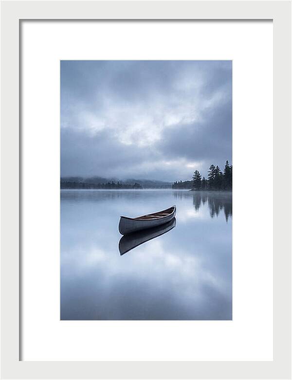 Canoe On A Tranquil Lake