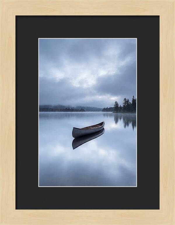 Canoe On A Tranquil Lake