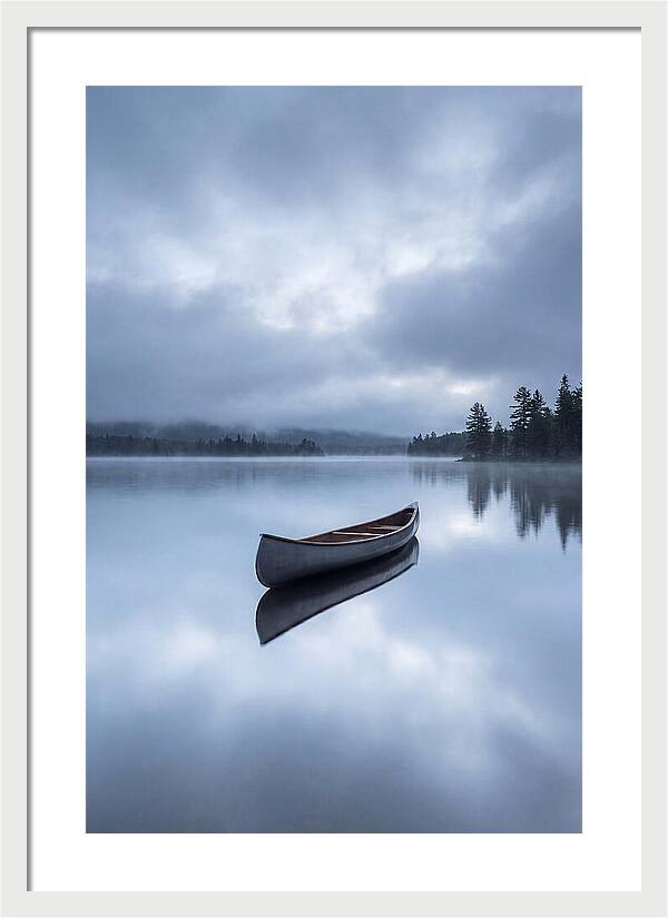 Canoe On A Tranquil Lake