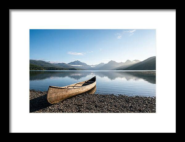 Canoe Resting On Serene Shore