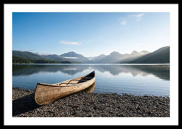 Canoe Resting On Serene Shore