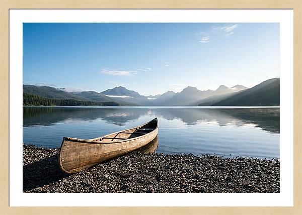 Canoe Resting On Serene Shore