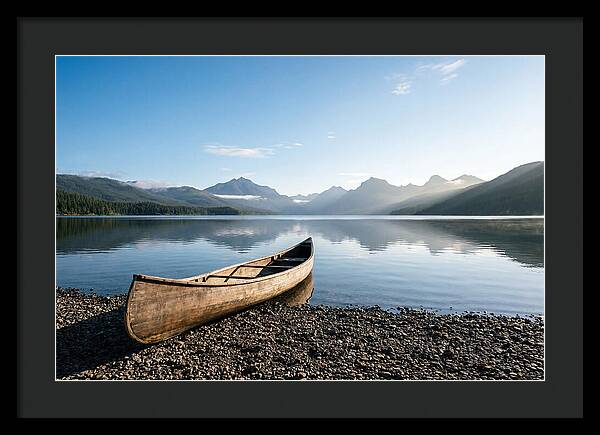 Canoe Resting On Serene Shore