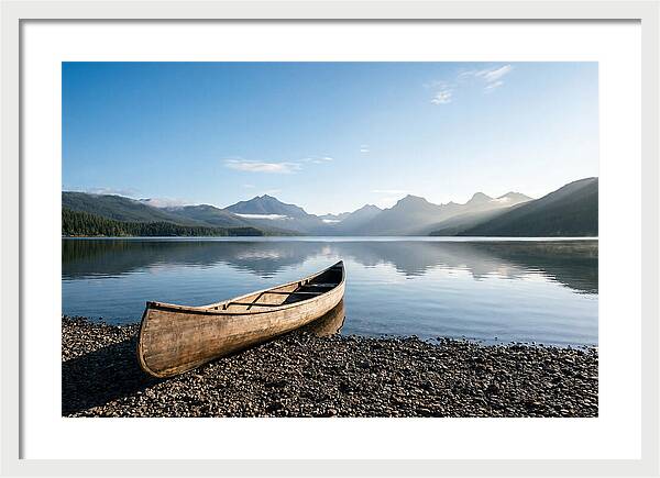 Canoe Resting On Serene Shore