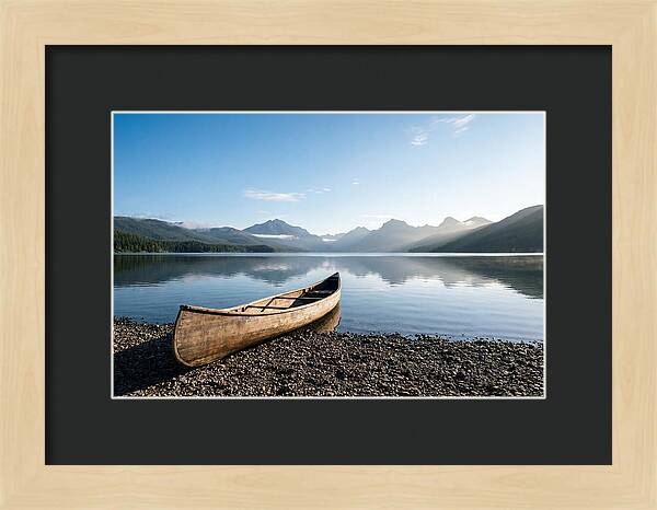 Canoe Resting On Serene Shore