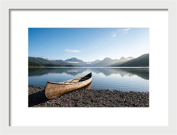 Canoe Resting On Serene Shore