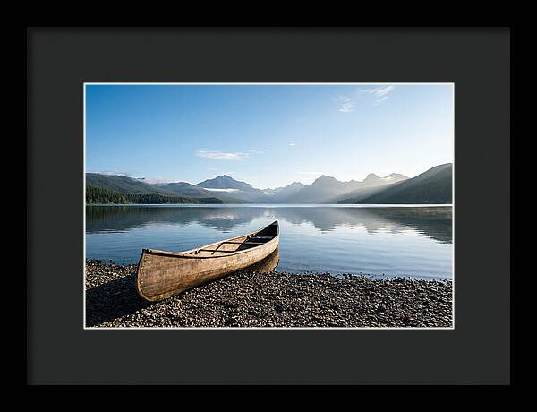 Canoe Resting On Serene Shore