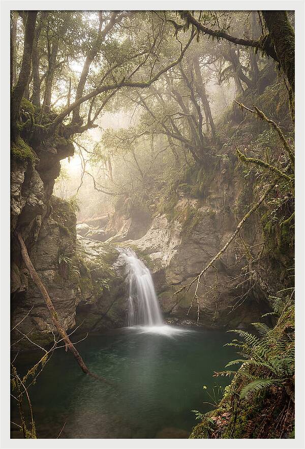 Cascading Waterfall Into Emerald Pool
