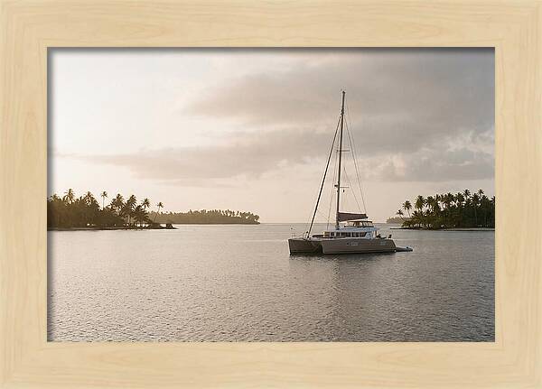 Catamaran Anchored In Tropical Lagoon