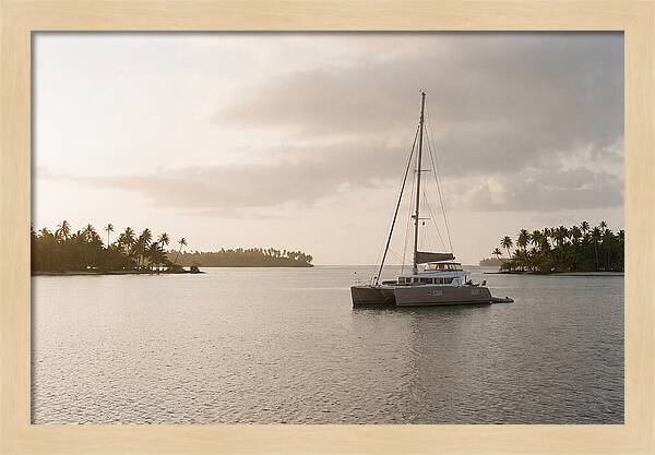 Catamaran Anchored In Tropical Lagoon