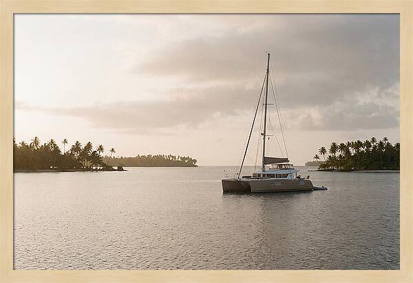 Catamaran Anchored In Tropical Lagoon
