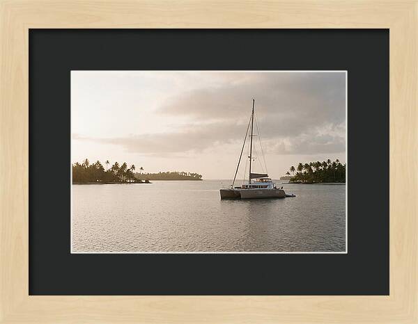 Catamaran Anchored In Tropical Lagoon