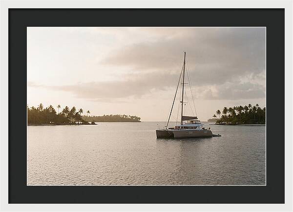Catamaran Anchored In Tropical Lagoon