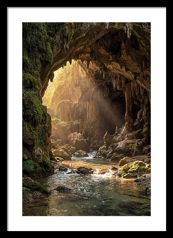 Cave Entrance Illuminated By Sunlight
