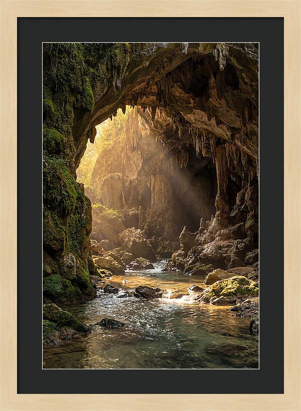 Cave Entrance Illuminated By Sunlight