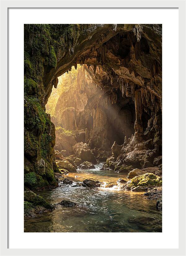 Cave Entrance Illuminated By Sunlight