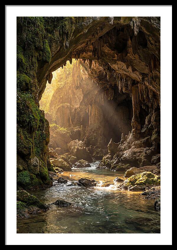 Cave Entrance Illuminated By Sunlight