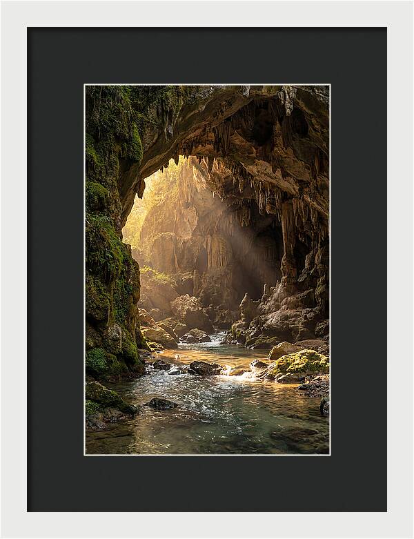 Cave Entrance Illuminated By Sunlight