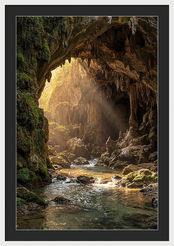 Cave Entrance Illuminated By Sunlight