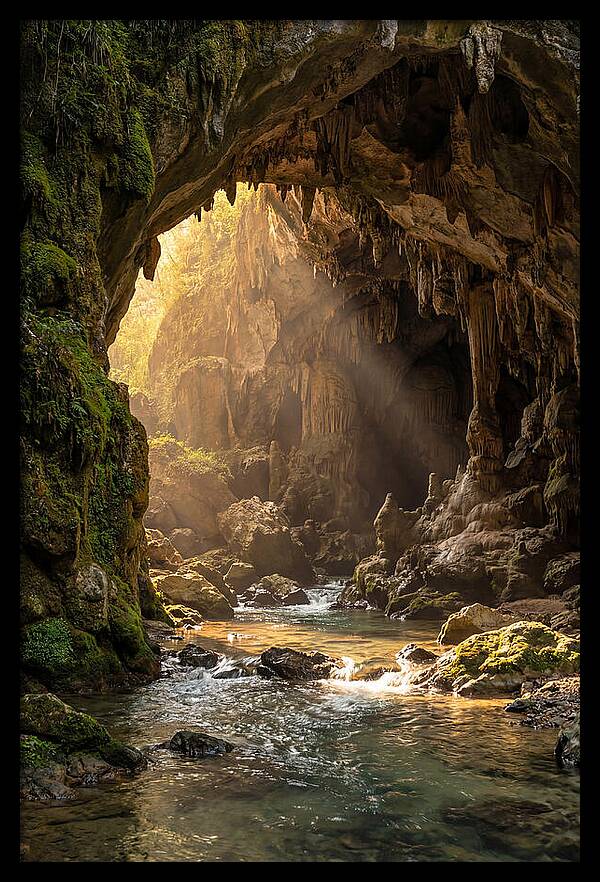 Cave Entrance Illuminated By Sunlight