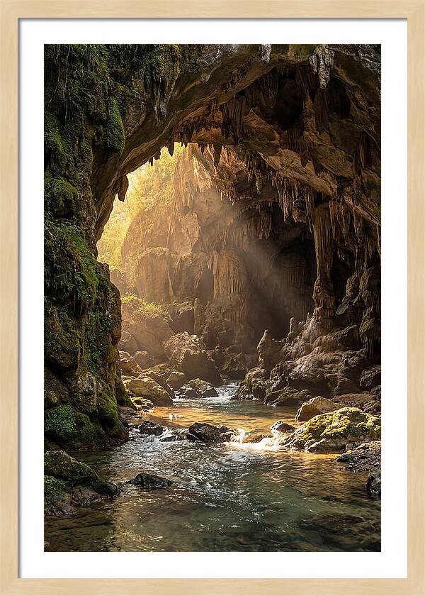 Cave Entrance Illuminated By Sunlight
