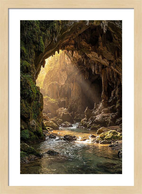 Cave Entrance Illuminated By Sunlight