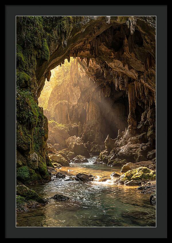 Cave Entrance Illuminated By Sunlight