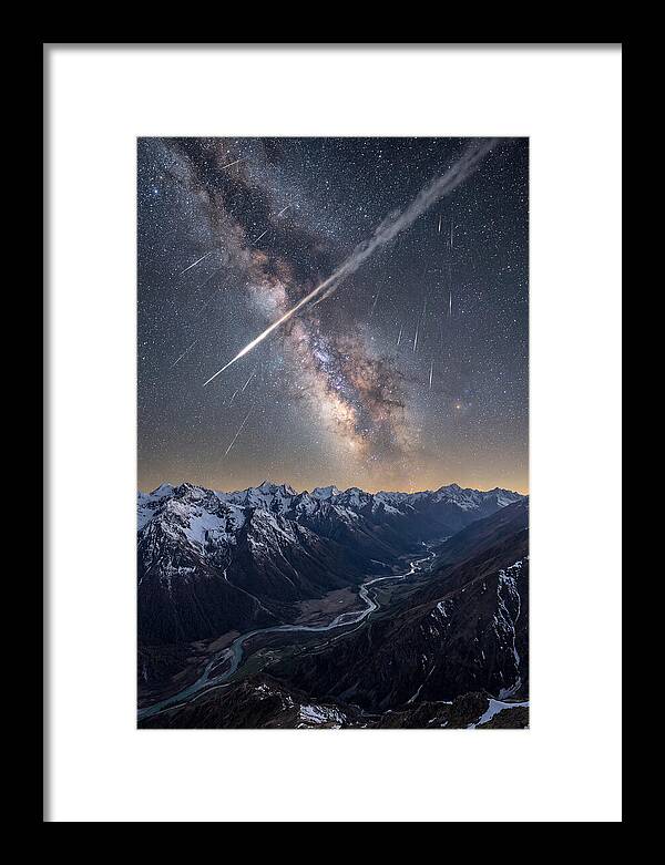 Celestial Dance Above Rugged Peaks