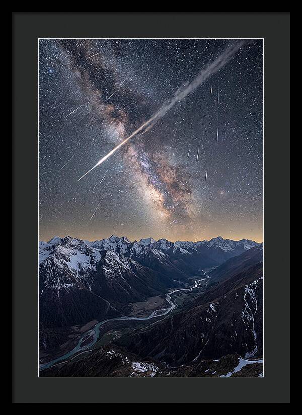 Celestial Dance Above Rugged Peaks