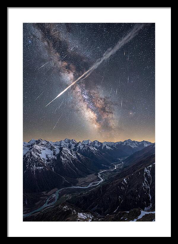 Celestial Dance Above Rugged Peaks